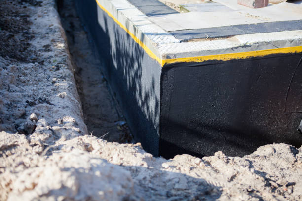 Professional Exterior Waterproofing technician working in Litchfield, MI